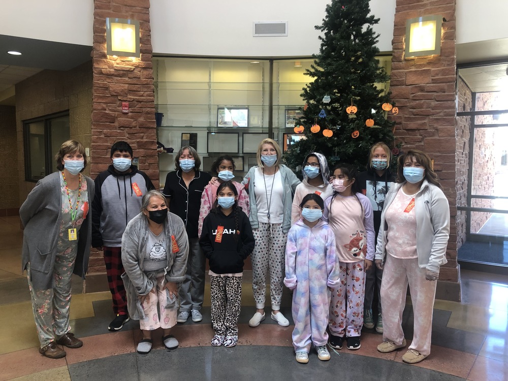 Photo of students and teachers in PJs