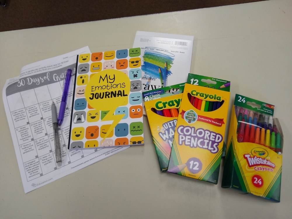 Art Supplies and Journals being distributed to 3rd - 6th grade students